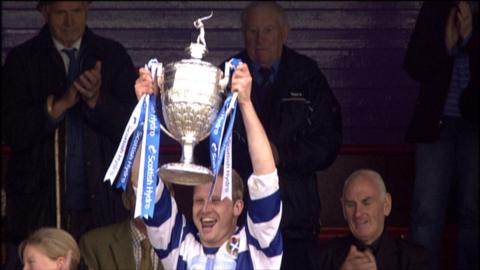 Newtonmore captain Scott Campbell with the Camanachd Cup
