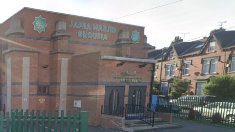 The outside entrance to the Jamia Masjid Ghousia mosque in Armley.
