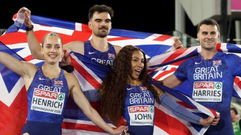Silver medalists Charlotte Henrich, Ben Jefferies, Yemi Mary John and Toby Harries of Team Great Britain celebrate after the Mixed 4x400 Metres Relay Final 