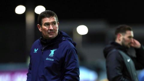 Nigel Clough watches his Mansfield Town side from the touchline