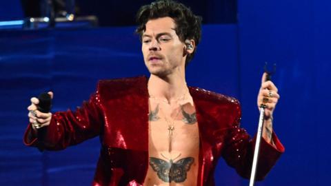 Harry Styles performs on stage during The BRIT Awards 2023 at The O2 Arena on February 11, 2023 in London, England. 