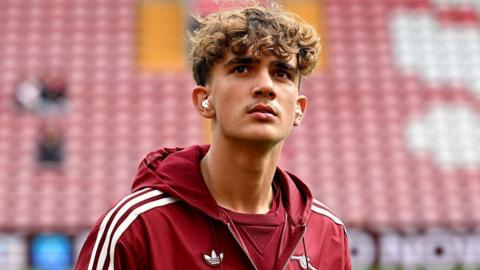 Max Dowman on the pitch before Arsenal's game at Liverpool last month