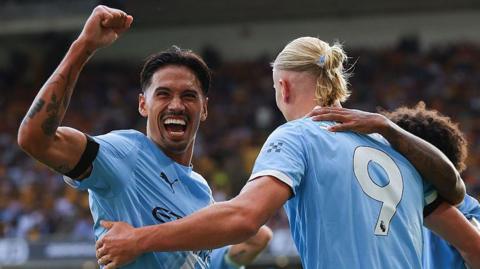 Tijjani Reijnders celebrates with Manchester City team-mates
