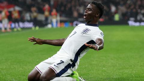 Bukayo Saka celebrates after putting England ahead in the World Cup qualifier against Serbia at Wembley.