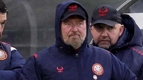 Niall Currie watches his Portadown team in action against Larne