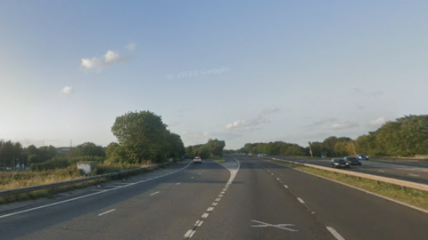 A Google Maps view of the M32, facing north on the northbound carriageway. The road is relatively empty, and it is a sunny day.