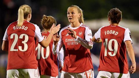 Arsenal players celebrate