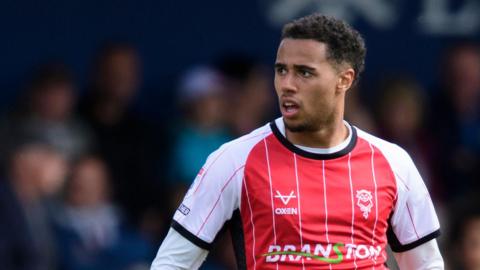 Ethan Erhahon in action for Lincoln City