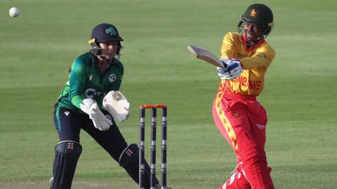 Ireland wicketkeeper Amy Hunter and Zimbabwe batter Kelis Ndlovu in 2024