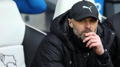 Paul Warne in the dugout for Derby County