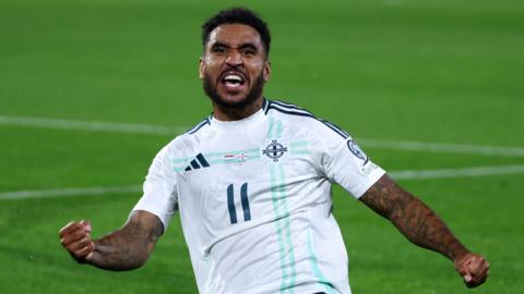 Northern Ireland's Jamie Reid celebrates with a fist pump