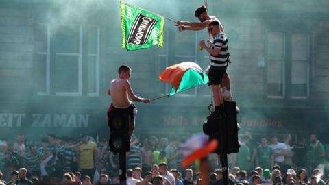 Fans on lamp posts