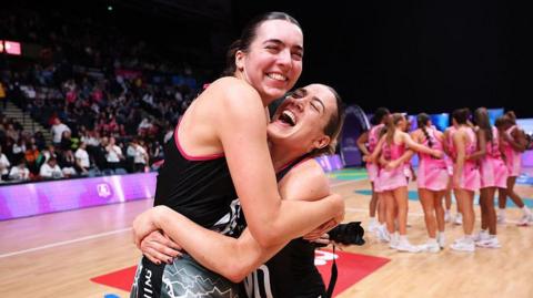 Nat Panagarry of Loughborough Lightning celebrates with team-mate Alice Harvey