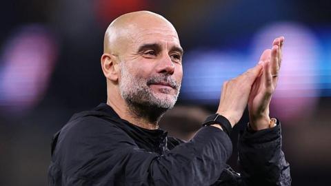 Pep Guardiola applauds
