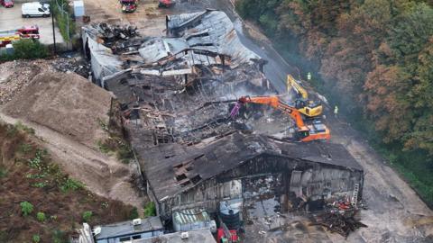 An aerial view of the extent of the burnt building