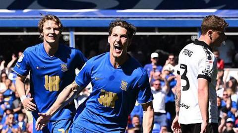 Phil Neumann celebrates giving Birmingham the lead over Bristol City