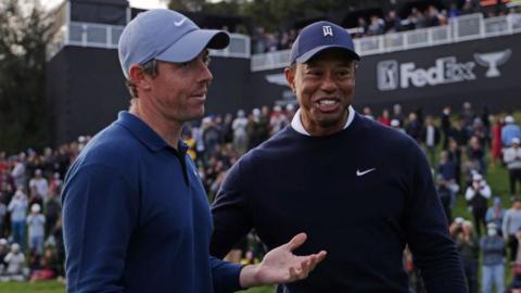 Rory McIlroy and Tiger Woods pictured during the Genesis Invitational in 2024