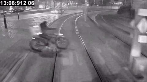 A cyclist on a tram track