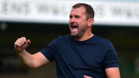 Torquay manager Paul Wotton celebrating