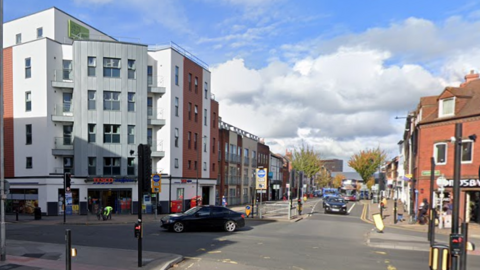 A street scene at the junction of Silver Street and London Road, two main roads in Reading.