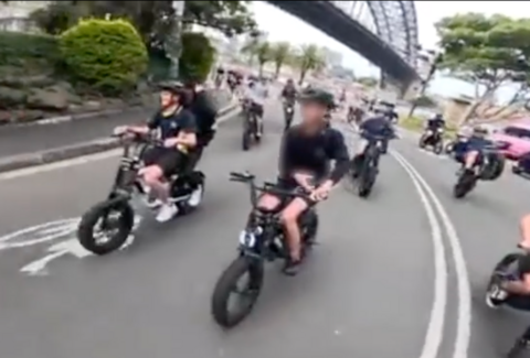 A split screen showing teens riding down a road on fatbikes in Sydney