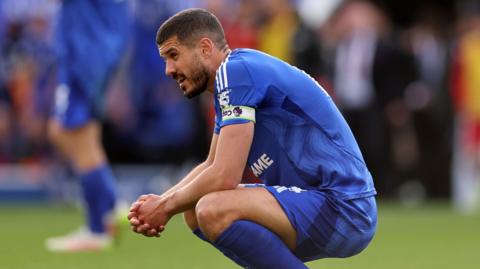 Conor Coady on his haunches as Leicester are relegated