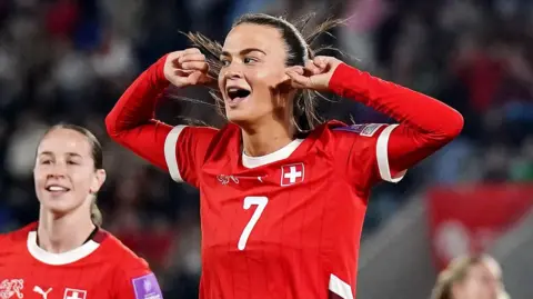 Xhemaili celebrating