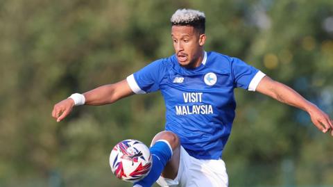 Striker Callum Robinson in pre-season action