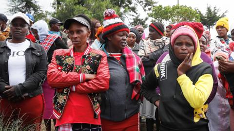 Women gather outside the Hillside Endarasha Academy