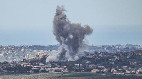 Plumes of smoke rise from the site of an Israeli airstrike on the village of Zawtar al-Sharqiyah in southern Lebanon.