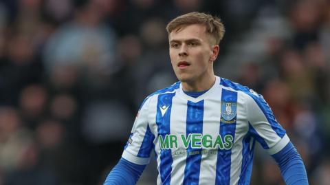 Jarvis Thornton wearing Sheffield Wednesday's blue-and-white striped home kit in a match last season