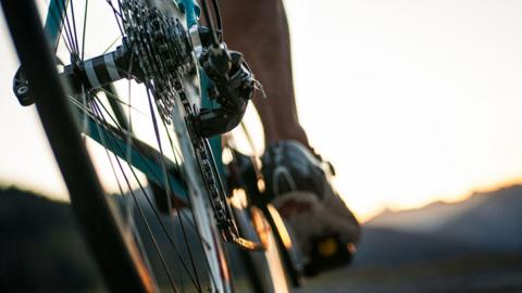 Close up of a foot on a bike pedal