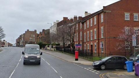 A section of Upper Parliament Street showing a series of apartment blocks and properties 