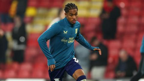 Jayden Meghoma warming up for Preston North End