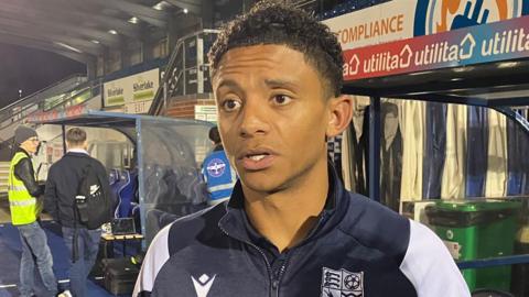 Nathan Ralph is interviewed pitchside