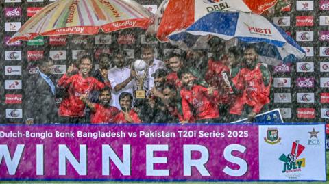 Bangladesh celebrate with the T20 series trophy