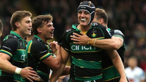 Alex Coles celebrates scoring for Northampton Saints against Exeter Chiefs