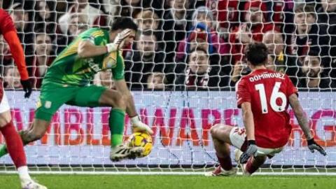 Aston Villa's Emiliano Martinez saves from Nottingham Forest's Nicolas Dominguez