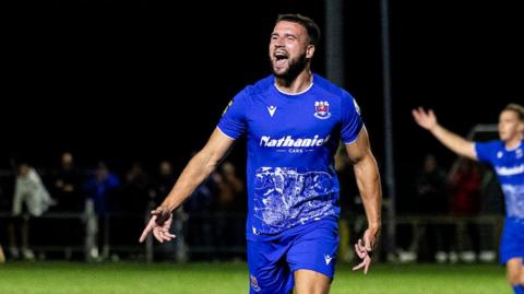 Penybont's Clayton Green celebrates scoring a goal