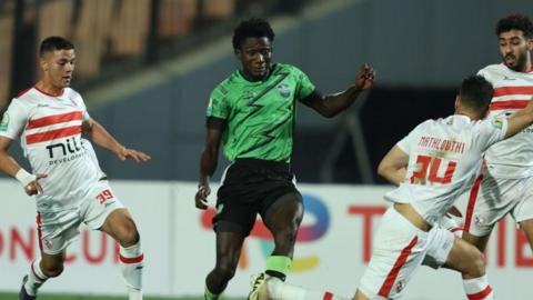 Emmanuel Agyei (centre) in action for Dreams