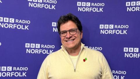 Norwich City's majority shareholder Mark Attanasio smiles for the camera