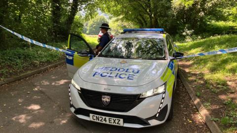 A Welsh police car and tape