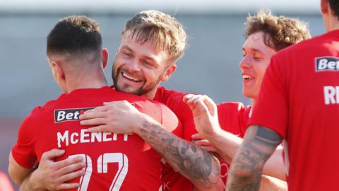 Andy Ryan celebrates