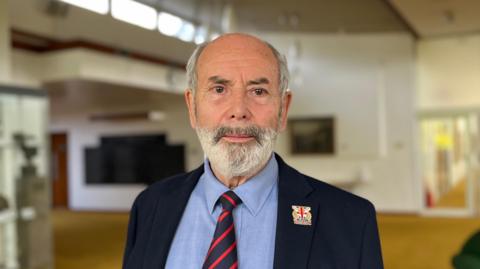 A portrait of Reform UK Leicestershire leader Dan Harrison at Leicestershire County Hall. 