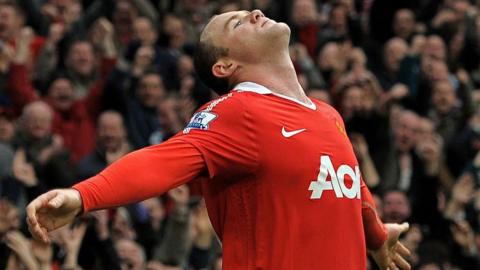 Wayne Rooney celebrating scoring an overhead kick for Man Utd against Man City in 2011.