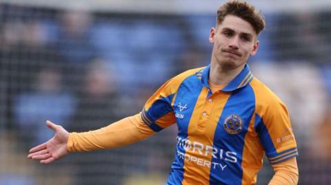George Lloyd in action for Shrewsbury