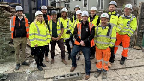 Construction companies on site, along with the residents of St Michael Avenue in Keyham.