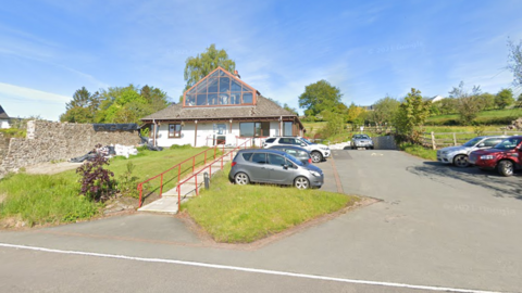 The front and car park of Bishop's Castle Medical Practice