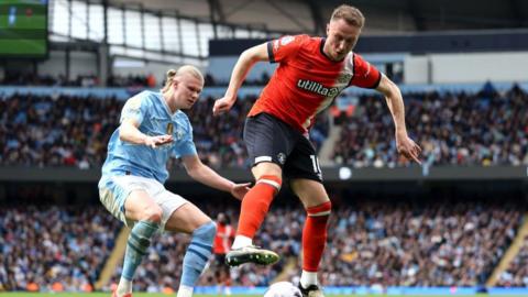 Cauley Woodrow and Erling Haaland 