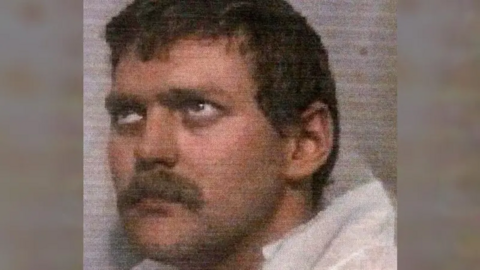 A grainy photograph of Steven Ling around the time of his conviction in 1998. He has brown hair and a moustache and is facing away from the camera.